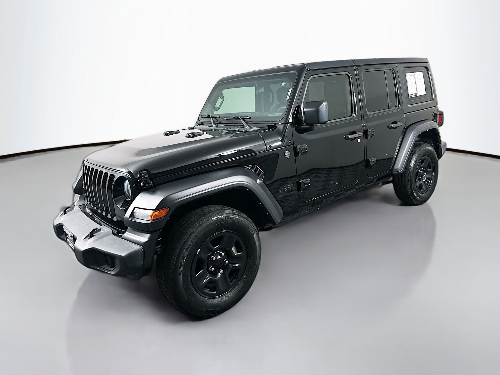 2023 Jeep Wrangler — rear three-quarter view