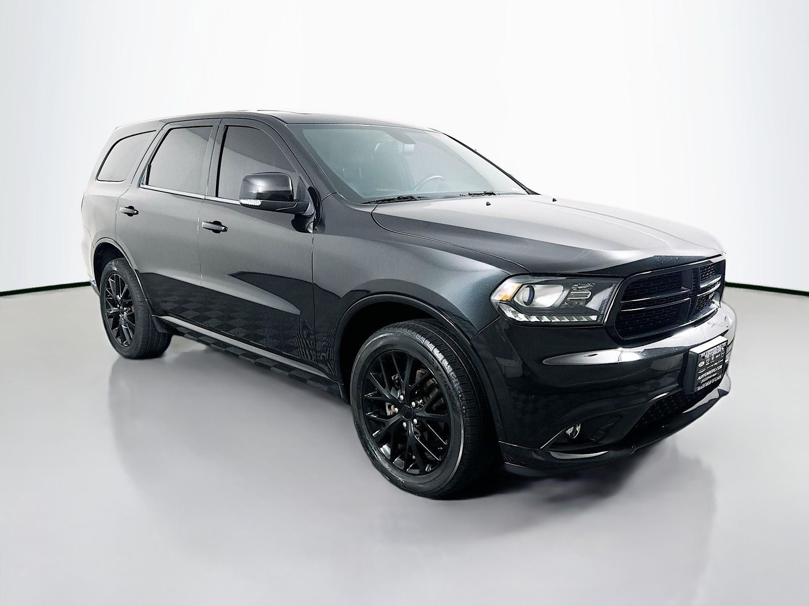 2015 Dodge Durango Limited in Brilliant Black Crystal Pearlcoat — front three-quarter view