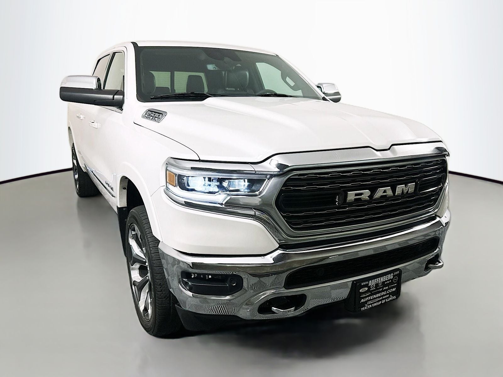 2019 RAM 1500 Limited in Ivory White Tri-Coat Pearlcoat — front three-quarter view