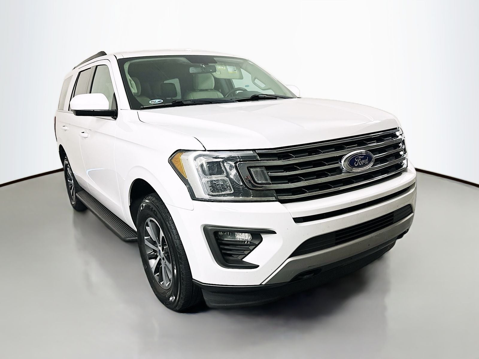 2018 Ford Expedition XLT in Oxford White — front three-quarter view