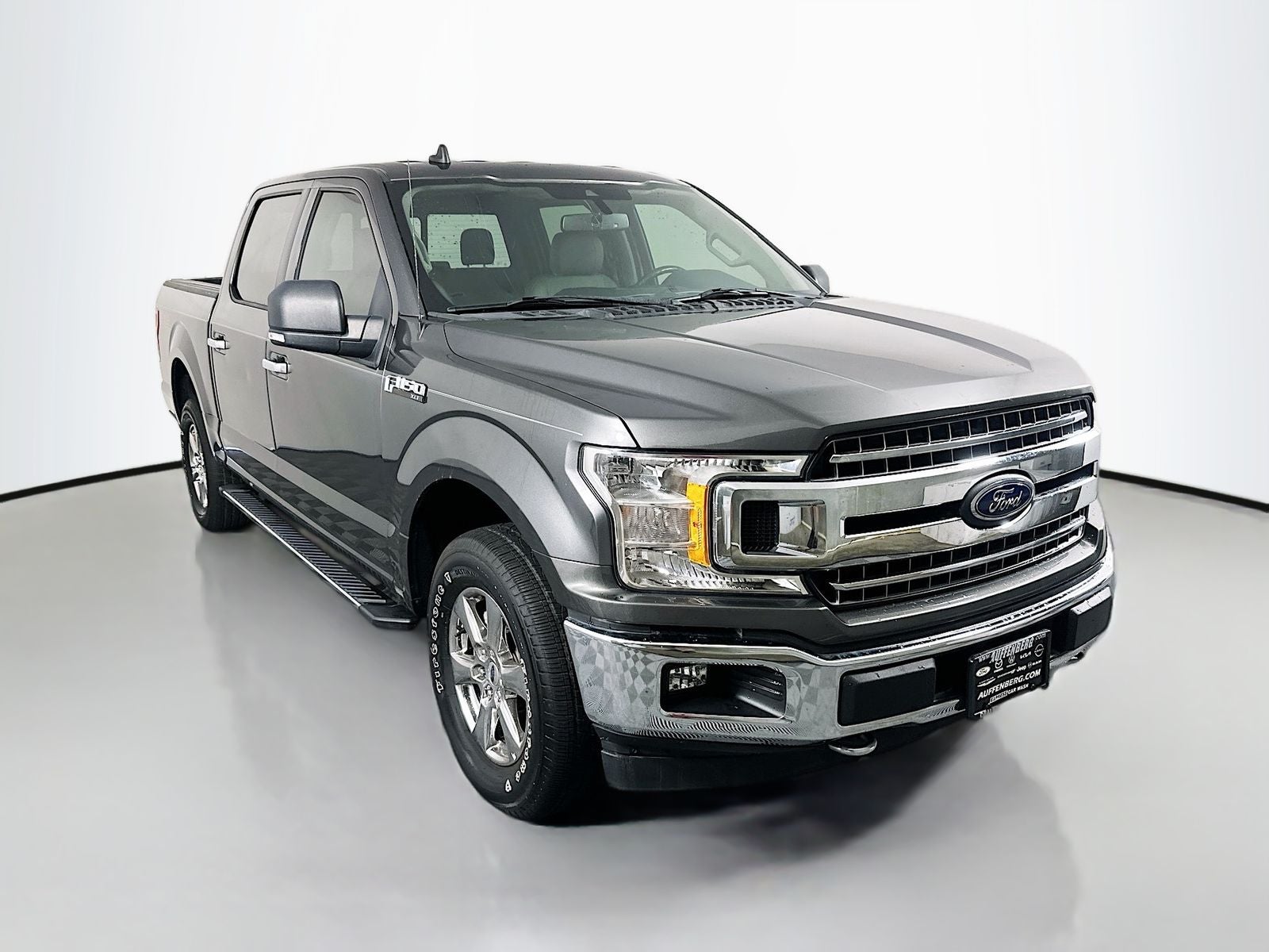 2019 Ford F-150 XLT in Magnetic Metallic — front three-quarter view