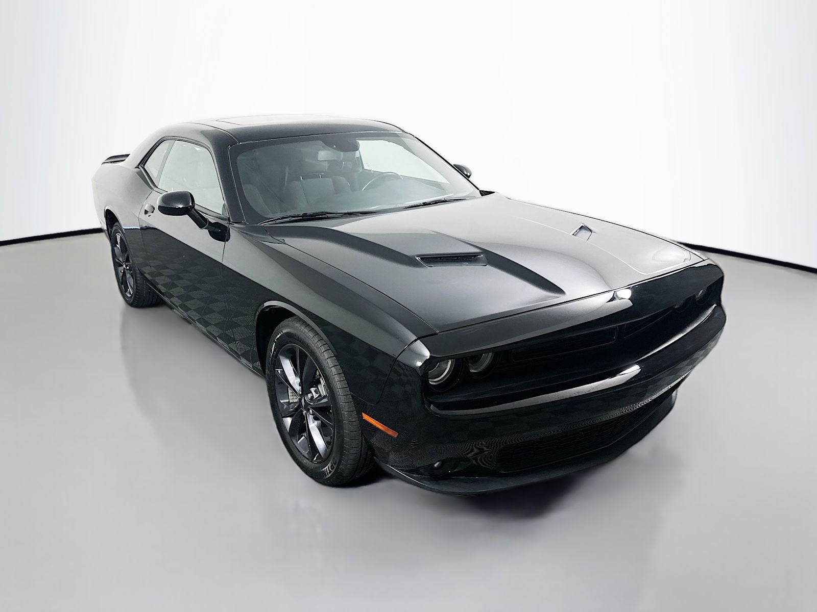 2023 Dodge Challenger SXT AWD in Pitch Black Clearcoat — front three-quarter view