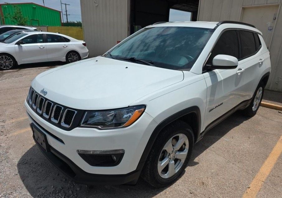 2017 Jeep New Compass Latitude FWD in White Clearcoat — front three-quarter view