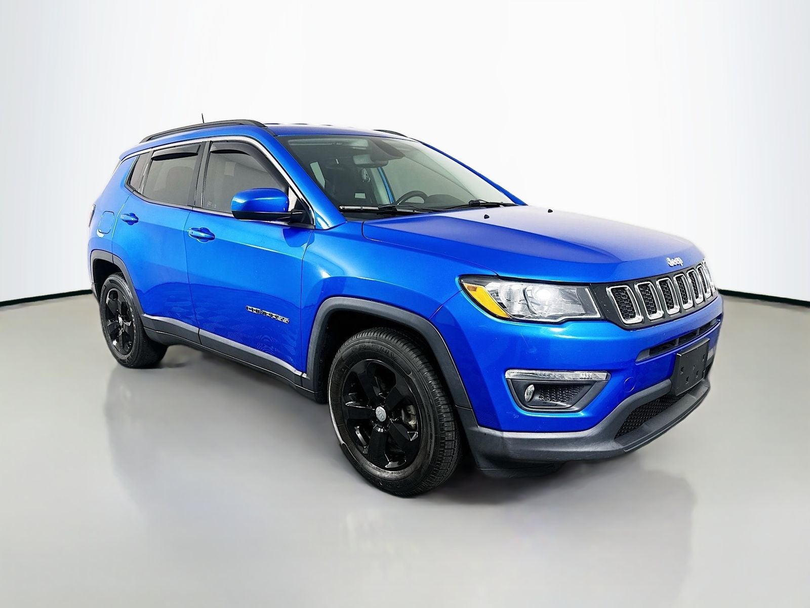 2020 Jeep Compass Latitude FWD in Laser Blue Pearlcoat — front three-quarter view