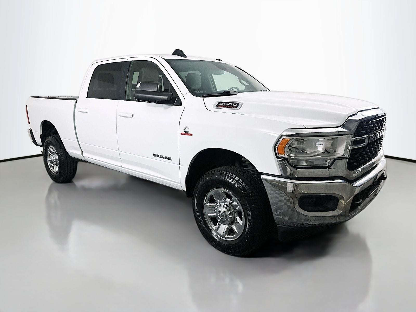 2022 RAM 2500 Big Horn Crew Cab 4x4 6'4' Box in Bright White Clearcoat — front three-quarter view