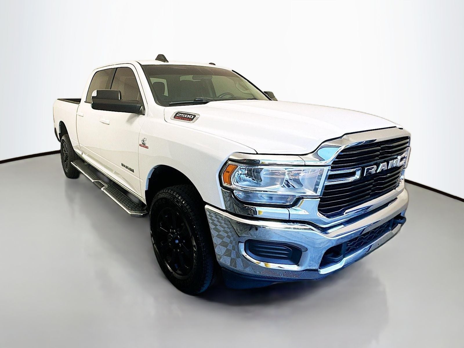 2020 RAM 2500 Big Horn Crew Cab 4x4 6'4' Box in Bright White Clearcoat — front three-quarter view