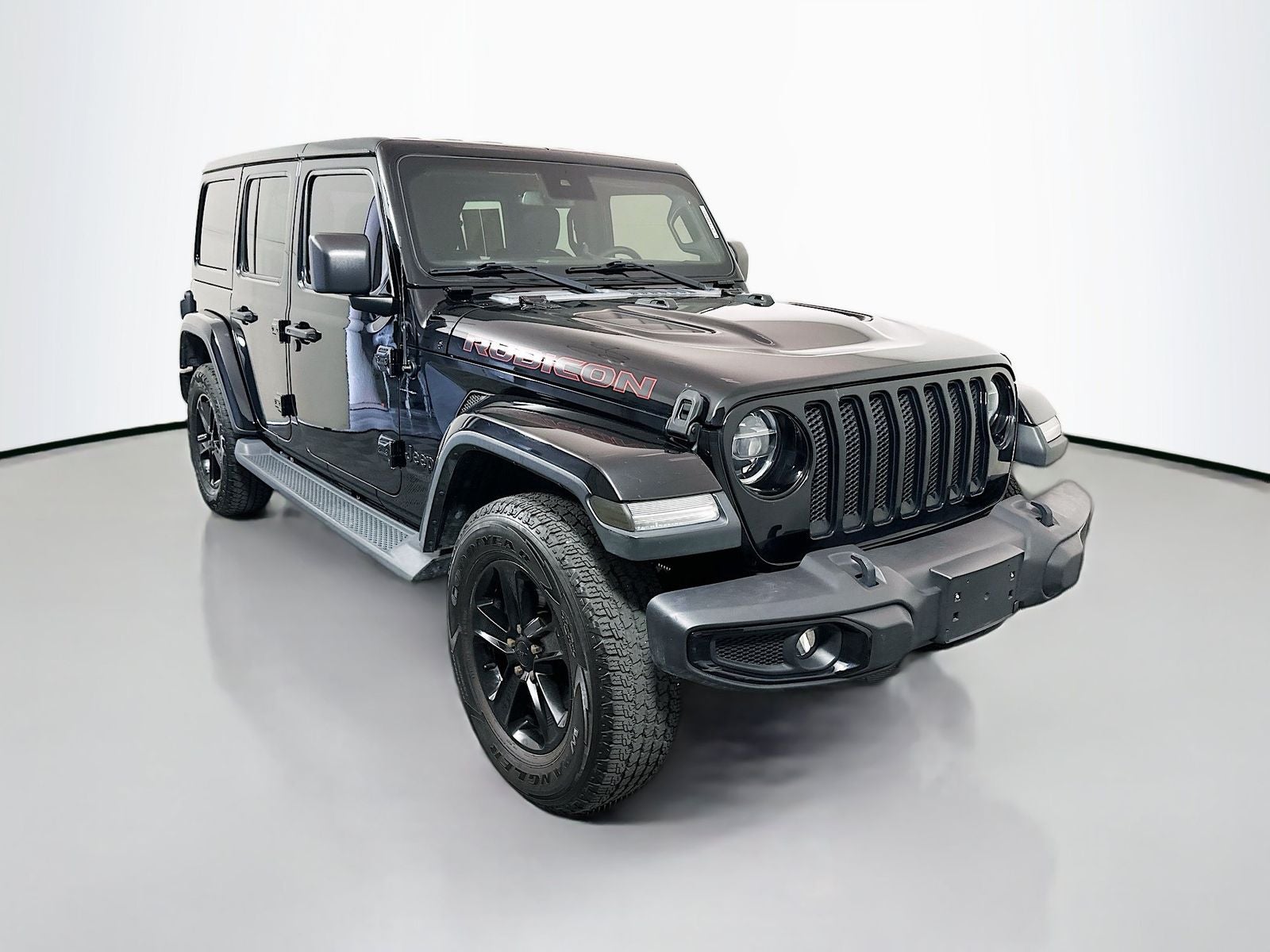 2020 Jeep Wrangler Unlimited Sahara in Black Clearcoat — front three-quarter view