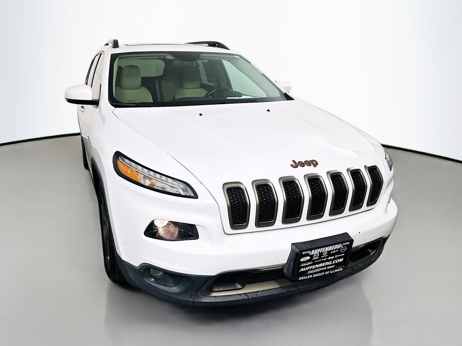 2016 Jeep Cherokee Latitude in Bright White Clearcoat — front three-quarter view