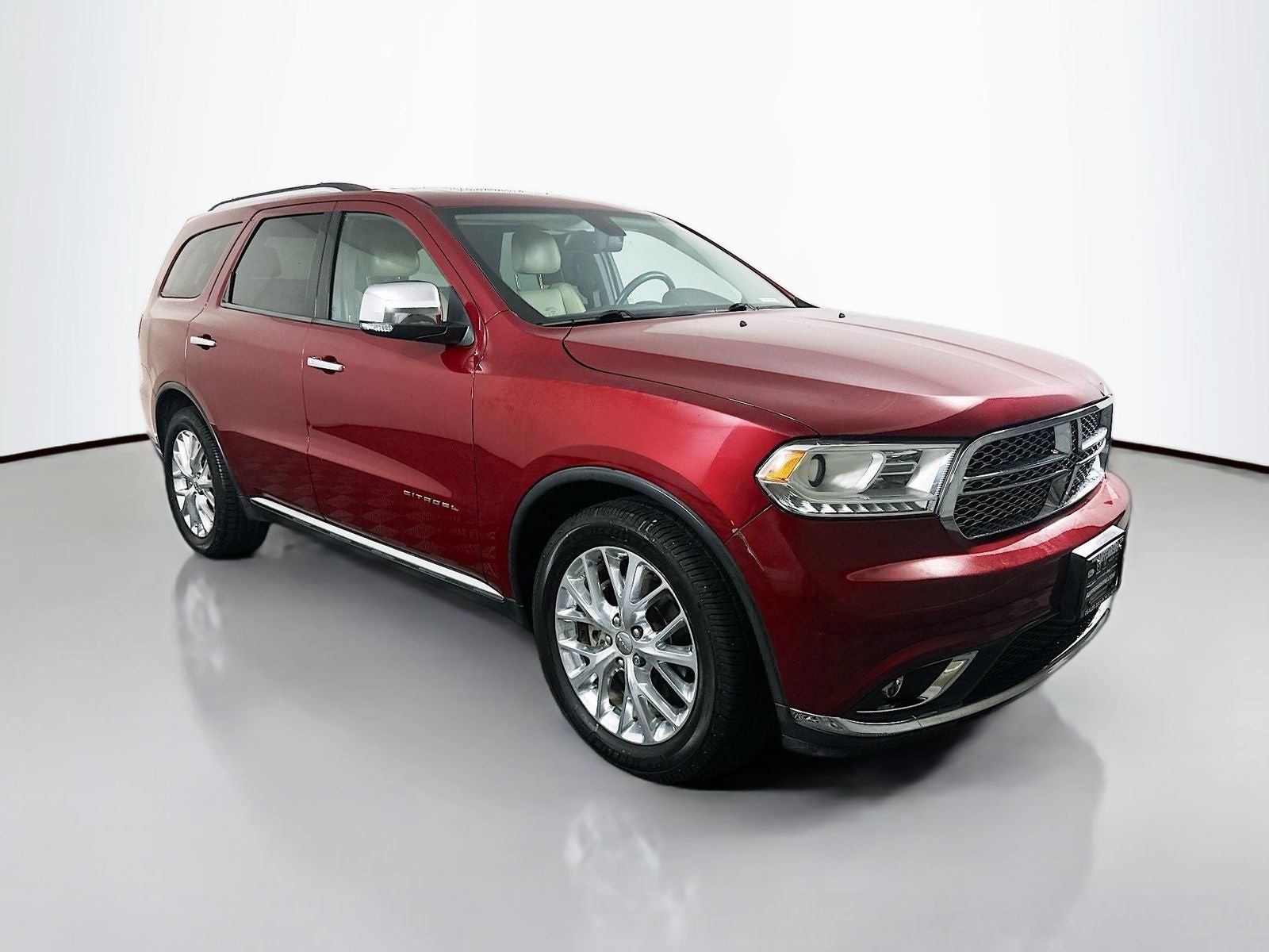 2015 Dodge Durango Citadel in Deep Cherry Red Crystal Pearlcoat — front three-quarter view
