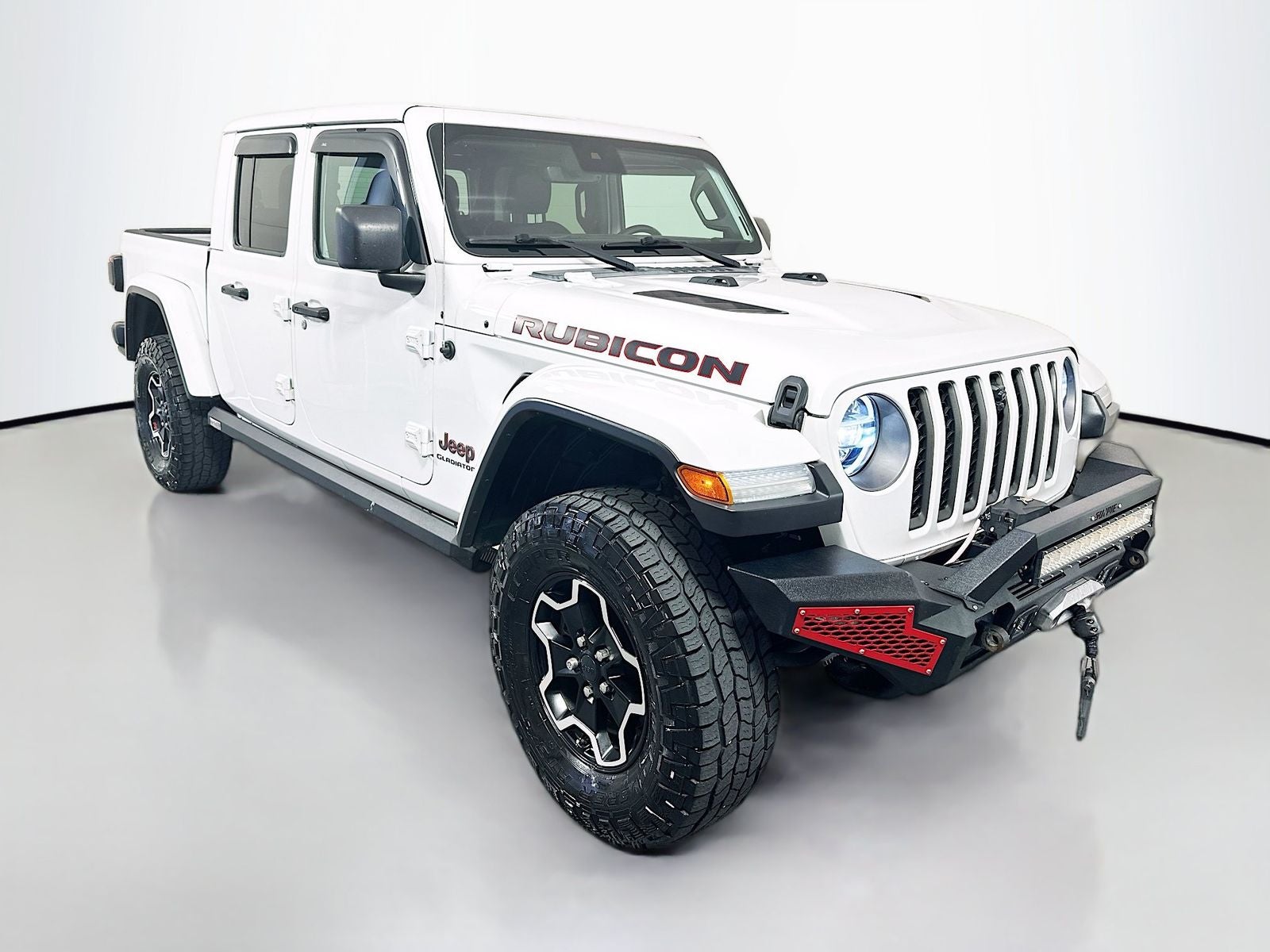 2020 Jeep Gladiator Rubicon in Bright White Clearcoat — front three-quarter view