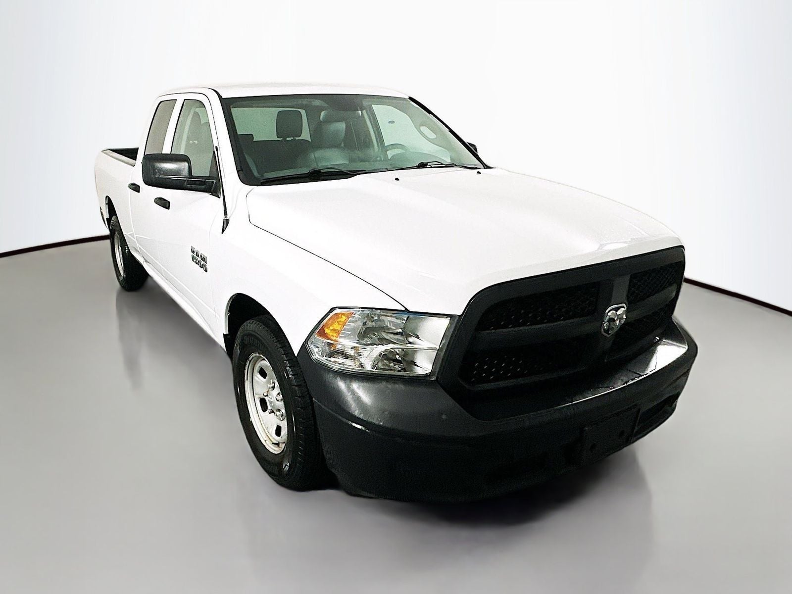 2016 RAM 1500 Tradesman in Bright White Clearcoat — front three-quarter view