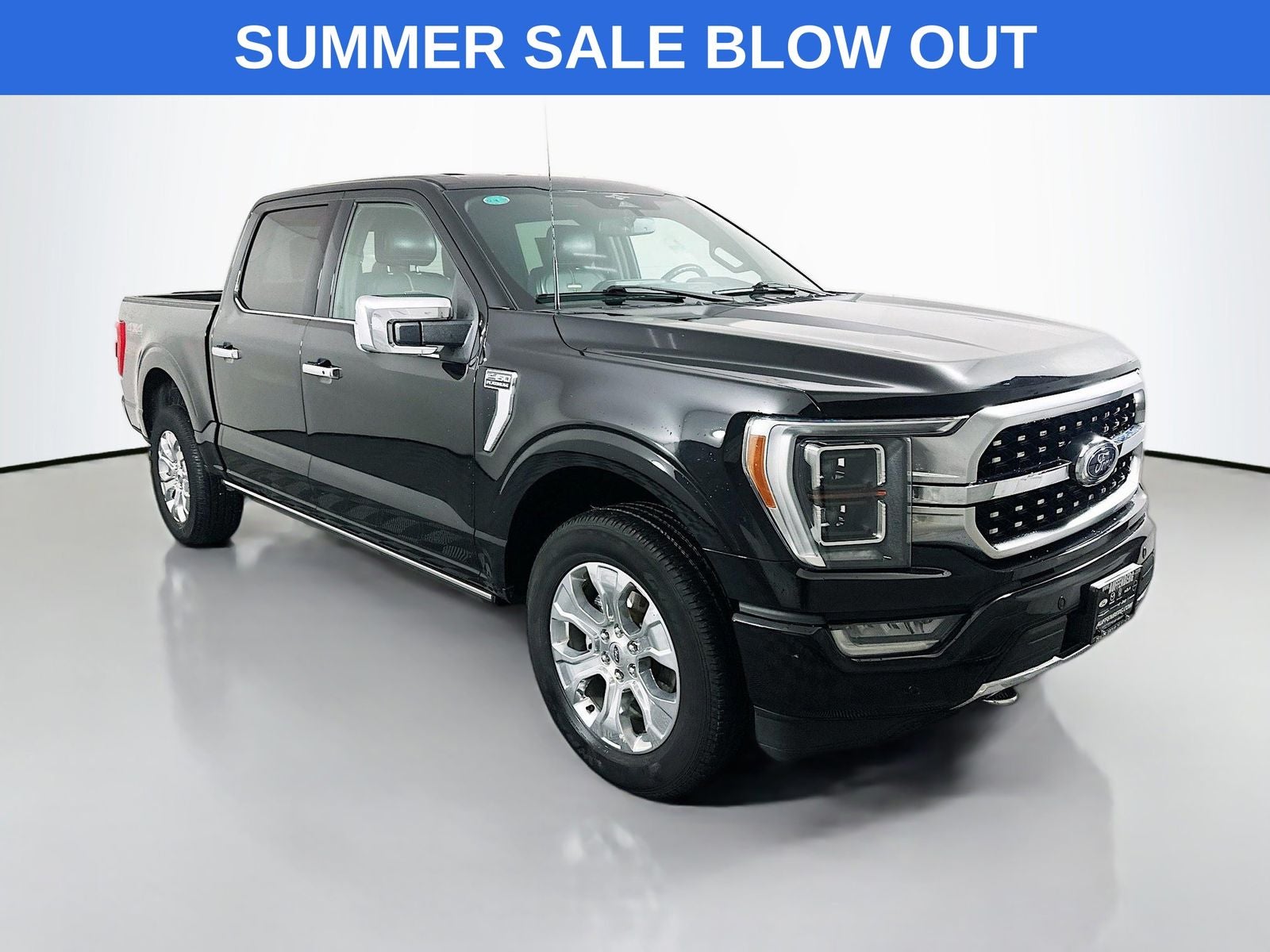 2023 Ford F-150 Platinum in Black Metallic — front three-quarter view