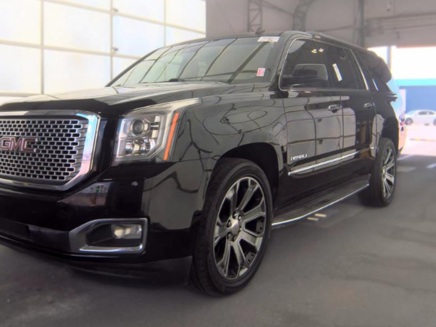 2015 GMC Yukon XL Denali in Onyx Black — front three-quarter view