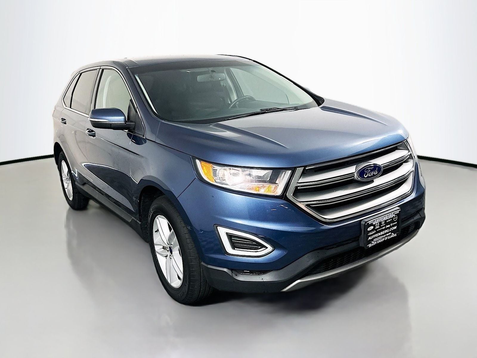 2018 Ford Edge SEL in Blue Metallic — front three-quarter view
