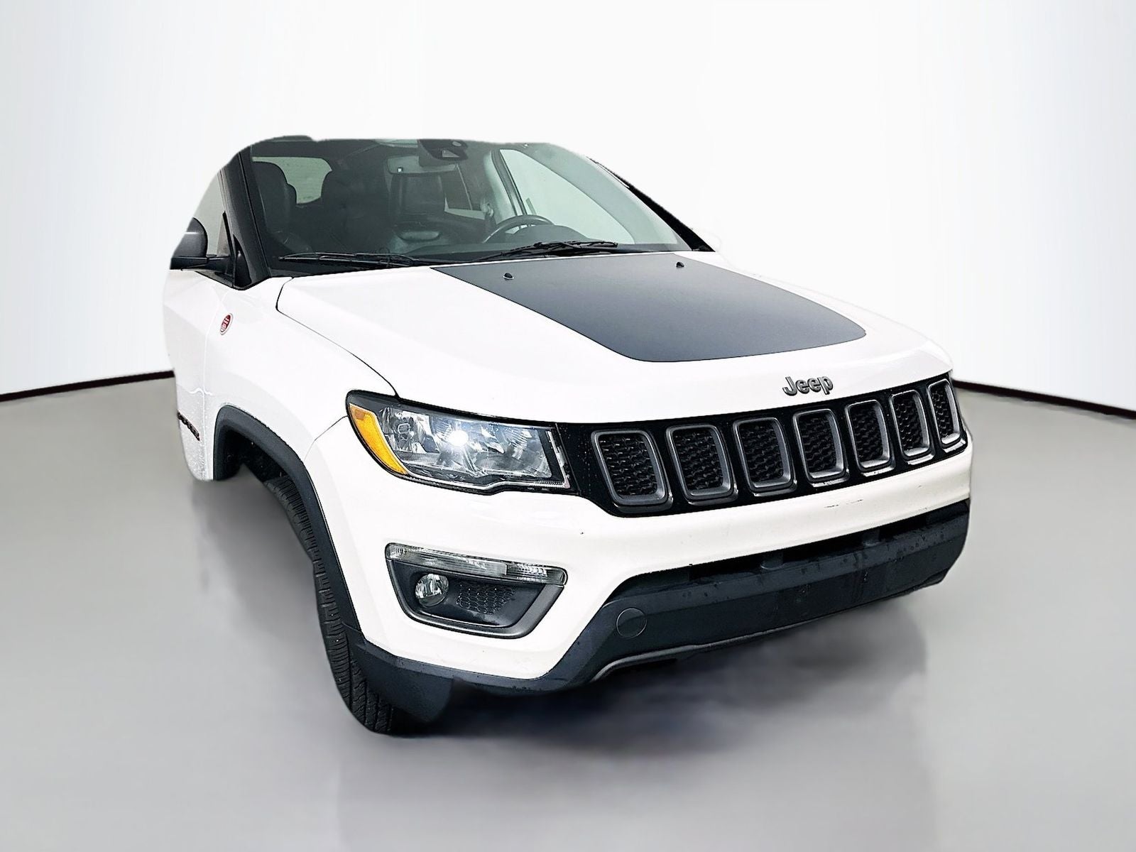 2021 Jeep Compass Trailhawk in White Clearcoat — front three-quarter view