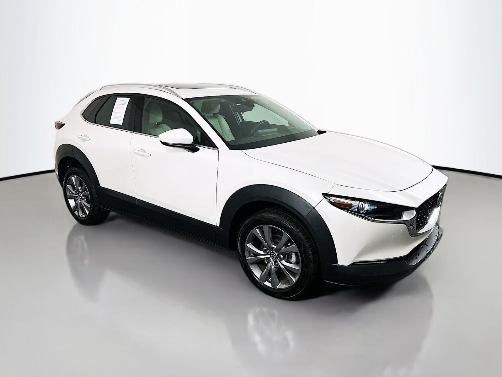 2022 Mazda Mazda CX-30 2.5 S Premium Package in Snowflake White Pearl Mica — front three-quarter view