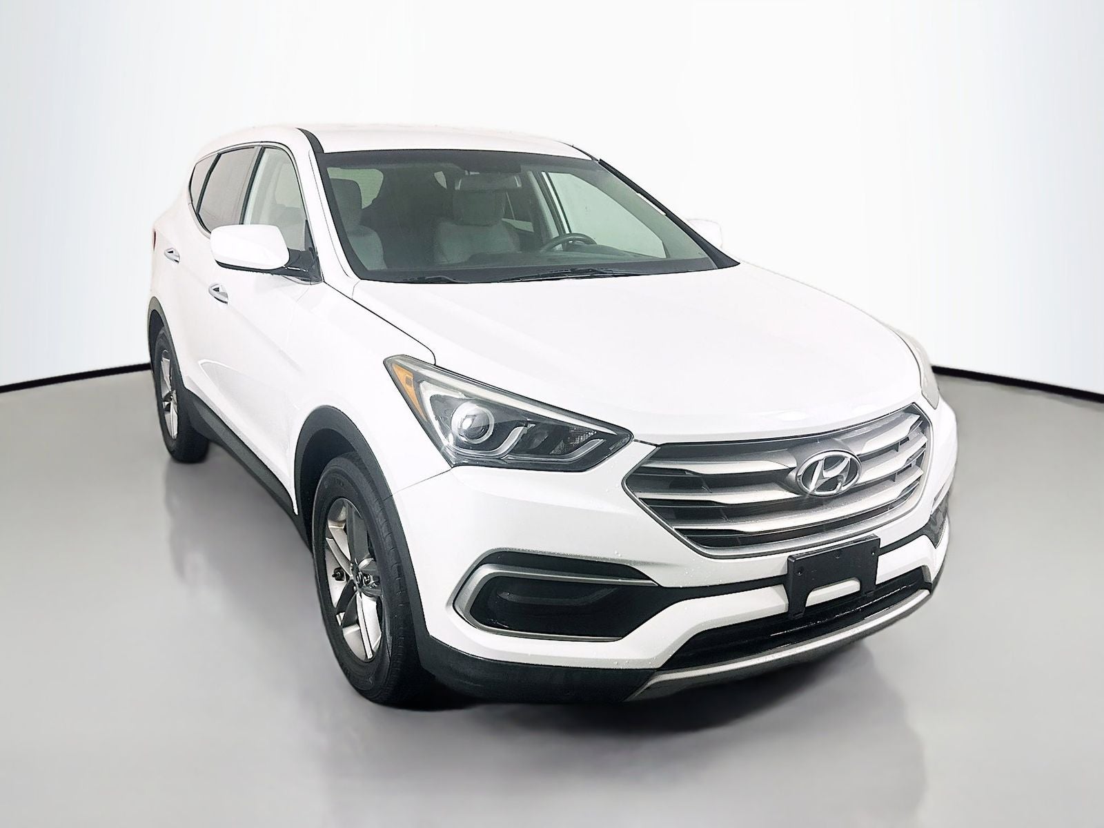 2017 Hyundai Santa Fe Sport 2.4 Base in Frost White Pearl — front three-quarter view