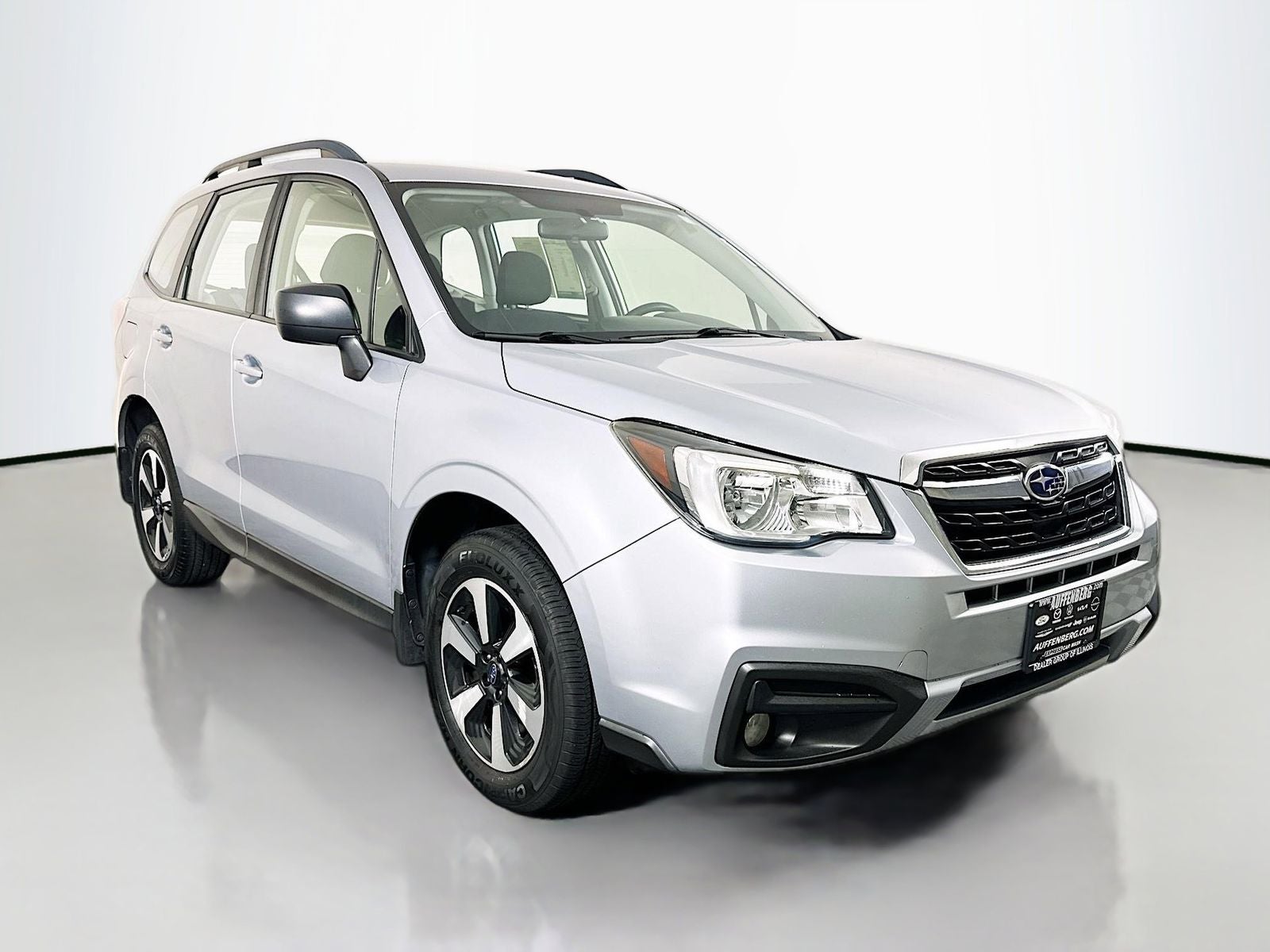 2017 Subaru Forester 2.5i in Ice Silver Metallic — front three-quarter view