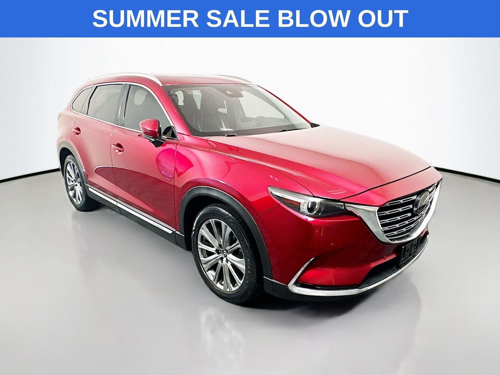 2023 Mazda Mazda CX-9 Signature in Soul Red Crystal Metallic — front three-quarter view
