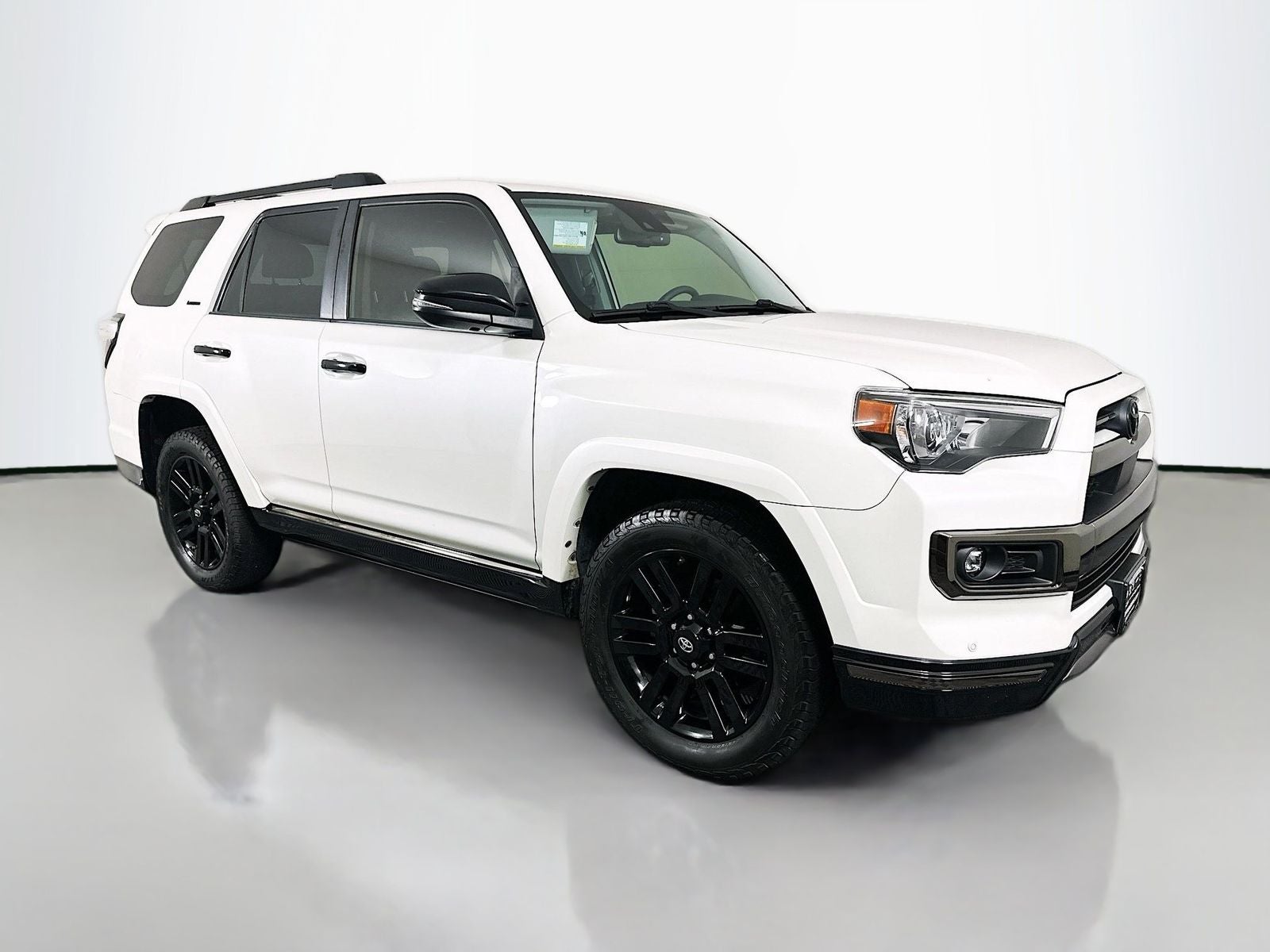 2021 Toyota 4Runner Nightshade in Blizzard Pearl — front three-quarter view