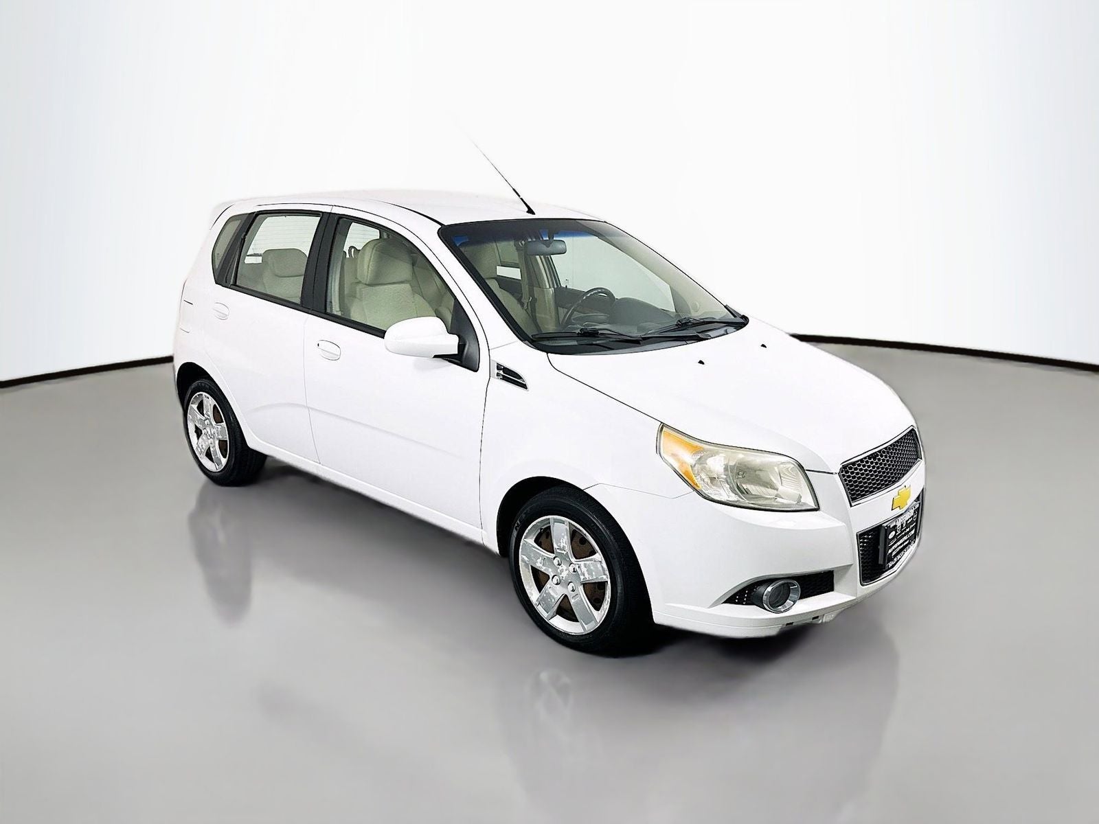 2011 Chevrolet Aveo5 2LT in Summit White — front three-quarter view
