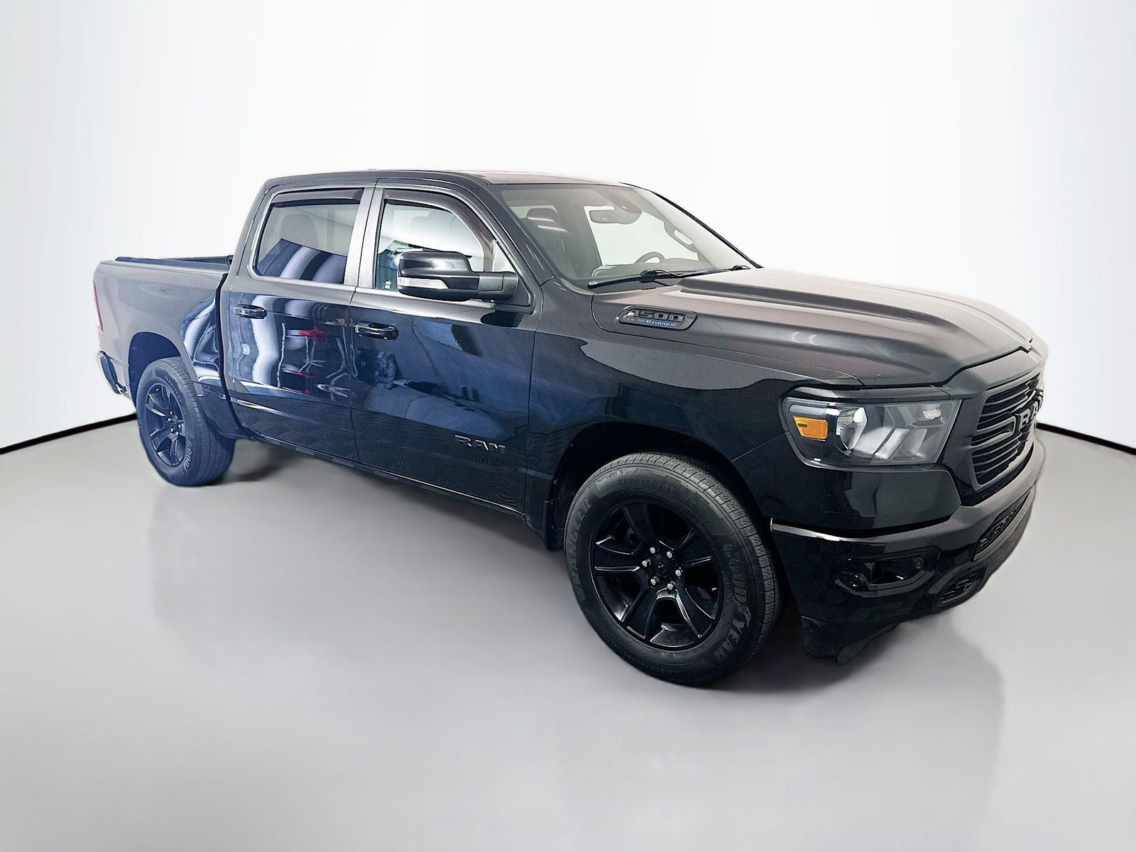2021 RAM 1500 Big Horn/Lone Star in Diamond Black Crystal Pearlcoat — front three-quarter view