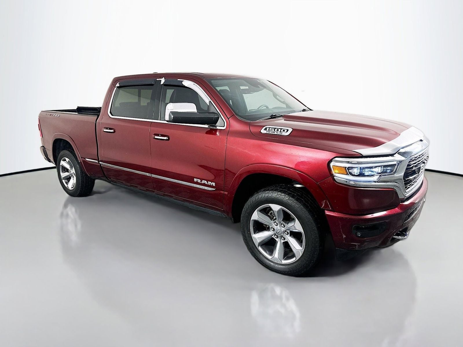 2019 RAM 1500 Limited in Delmonico Red Pearlcoat — front three-quarter view