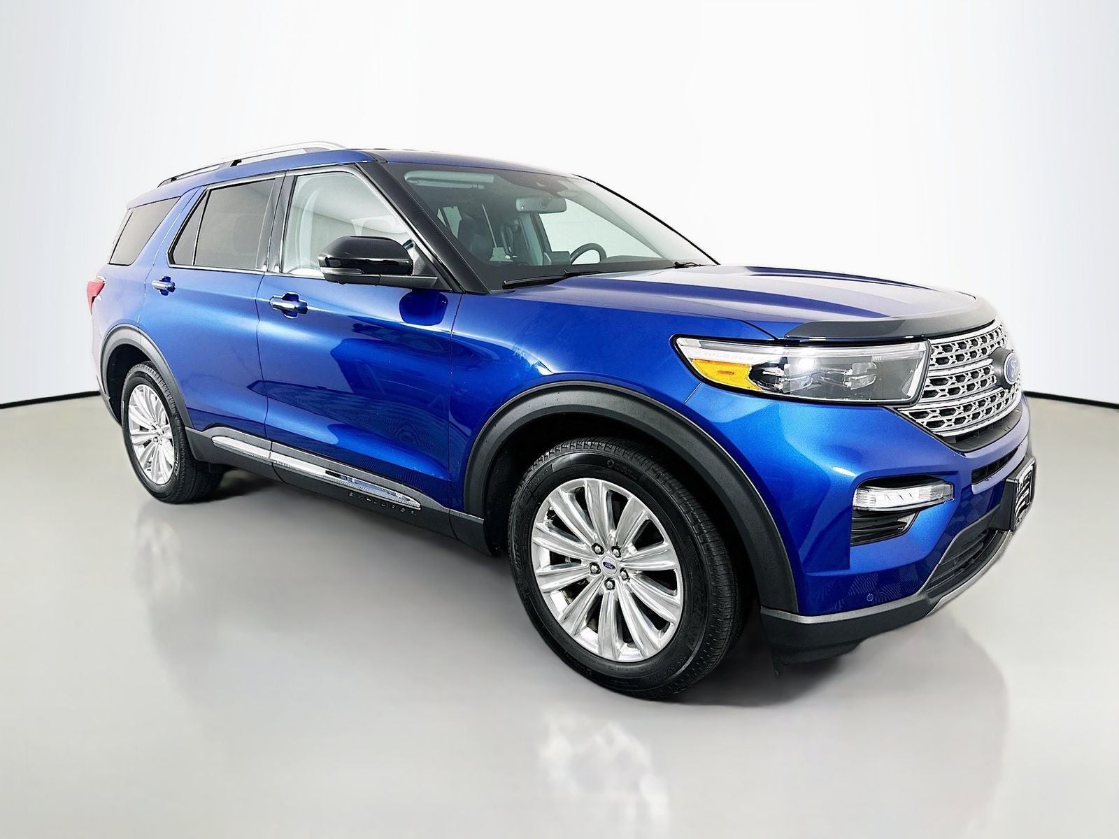 2023 Ford Explorer Limited in Blue Metallic — front three-quarter view
