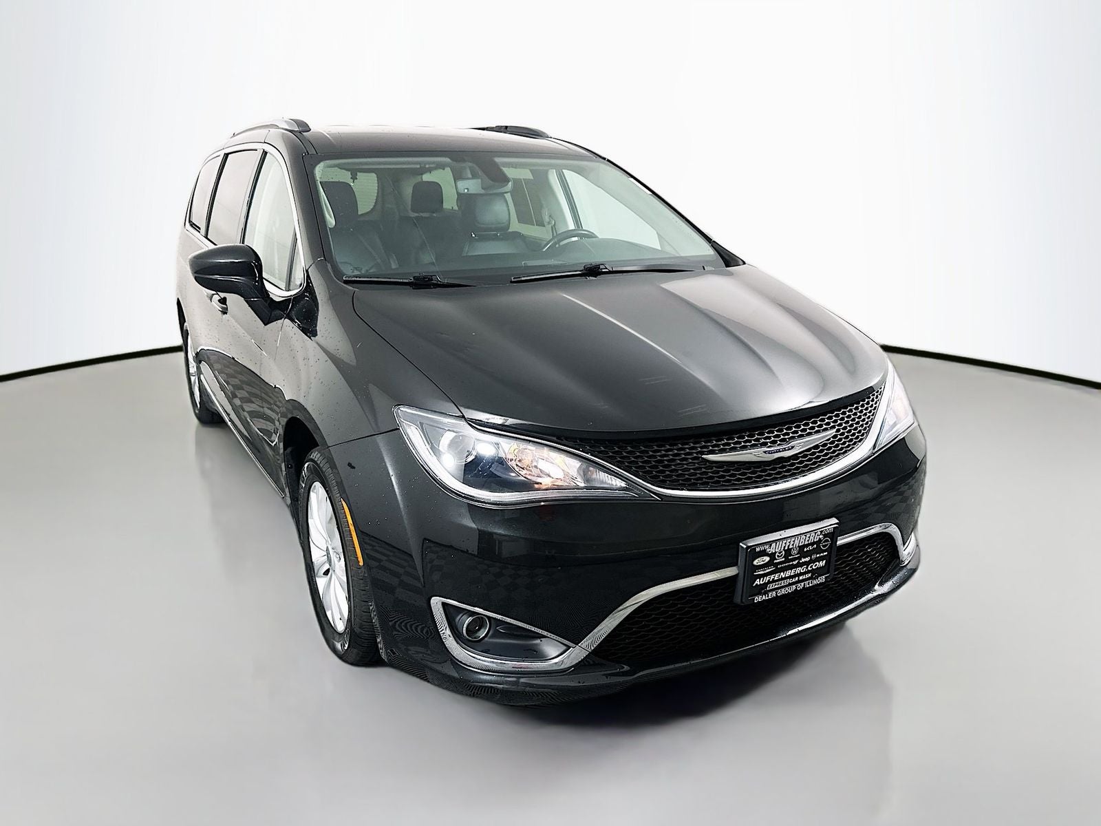 2020 Chrysler Pacifica Touring L in Brilliant Black Crystal Pearlcoat — front three-quarter view
