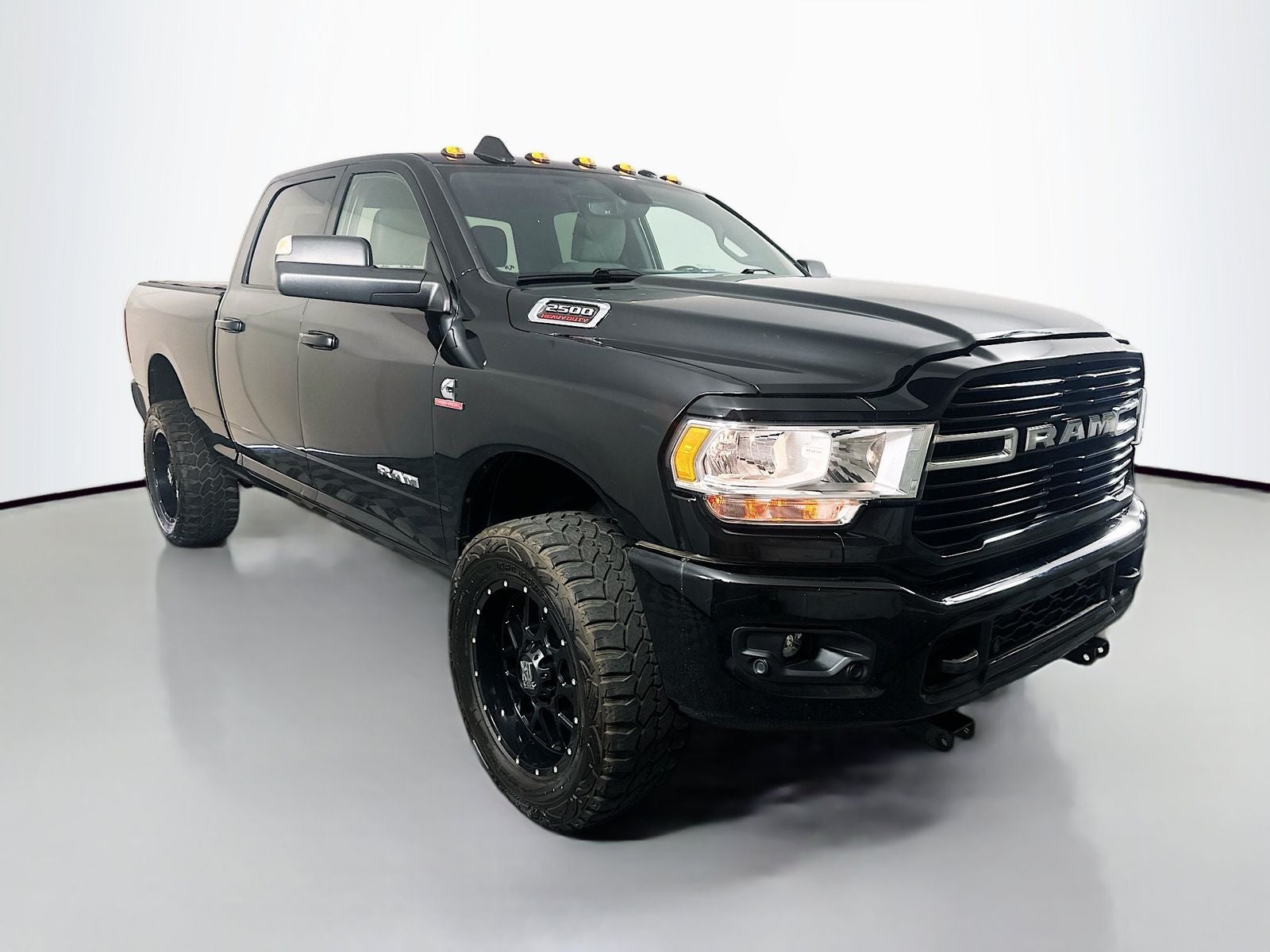 2020 RAM 2500 Big Horn in Diamond Black Crystal Pearlcoat — front three-quarter view
