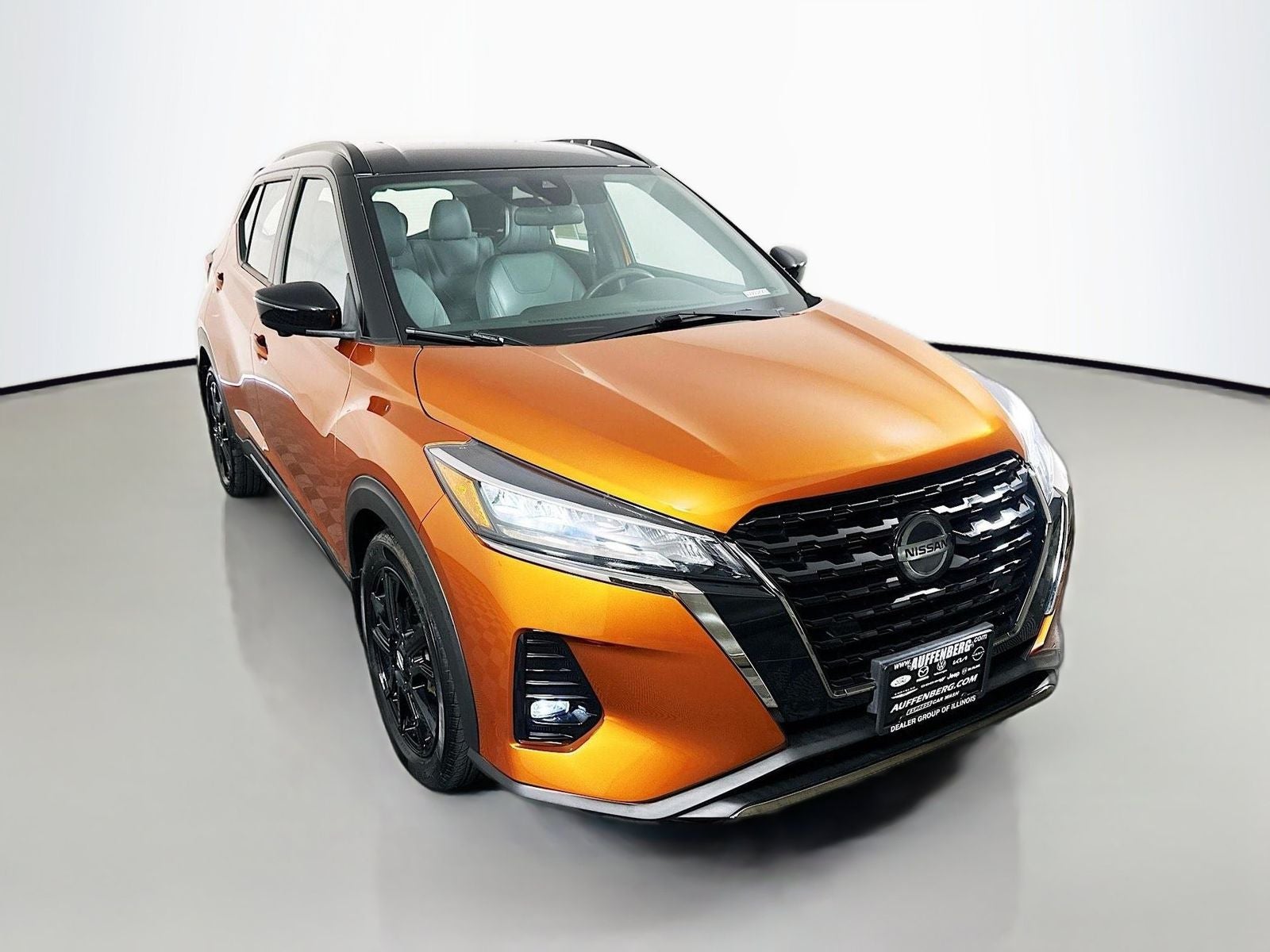 2021 Nissan Kicks SR in Super Black — front three-quarter view