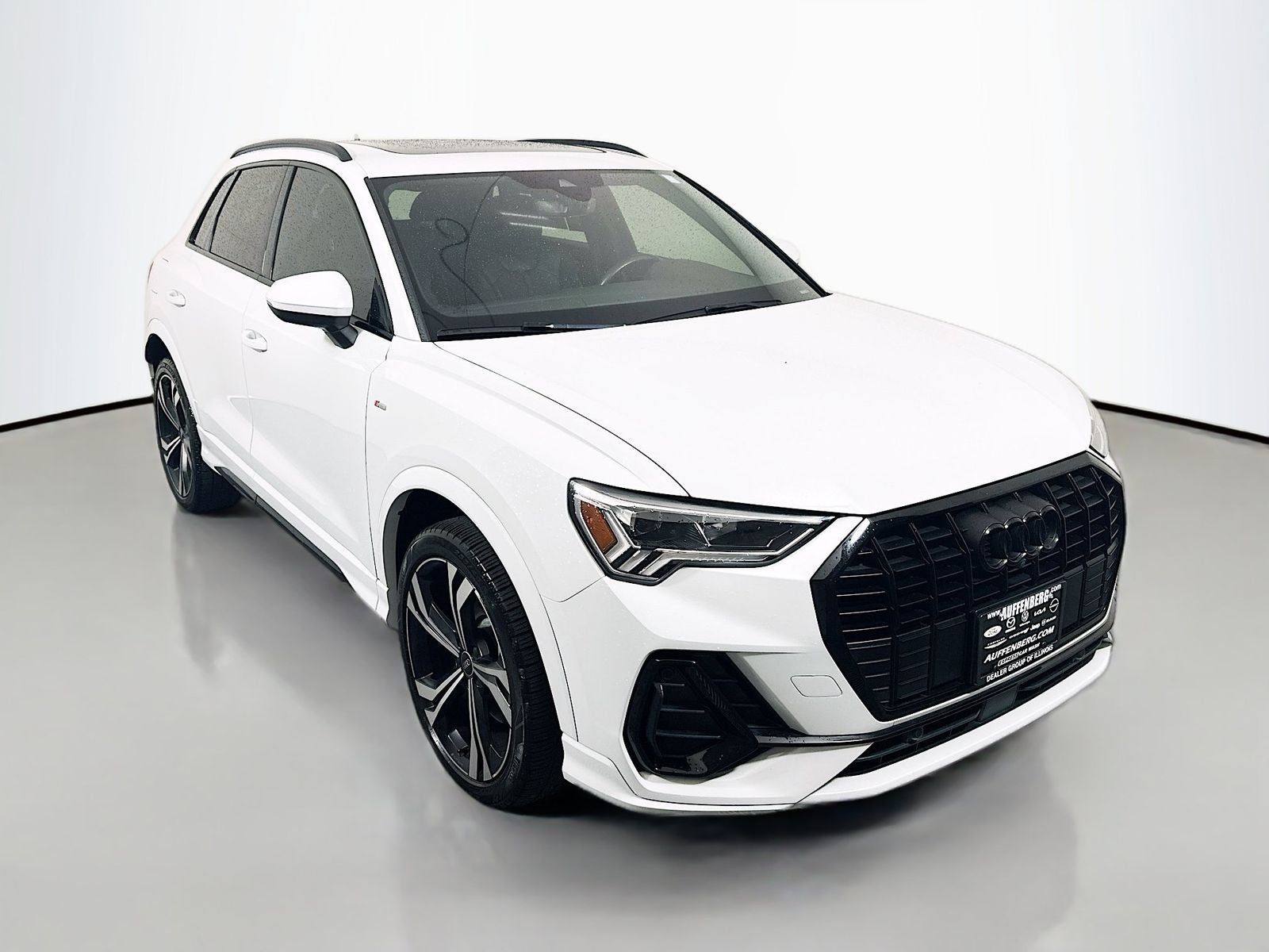 2023 Audi Q3 Premium Plus S Line quattro in Glacier White Metallic — front three-quarter view