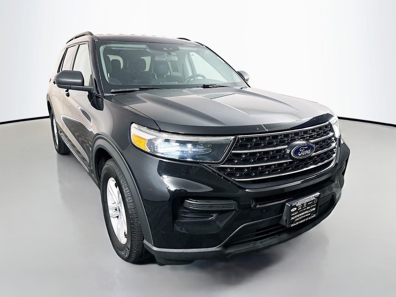 2021 Ford Explorer XLT in Black Metallic — front three-quarter view
