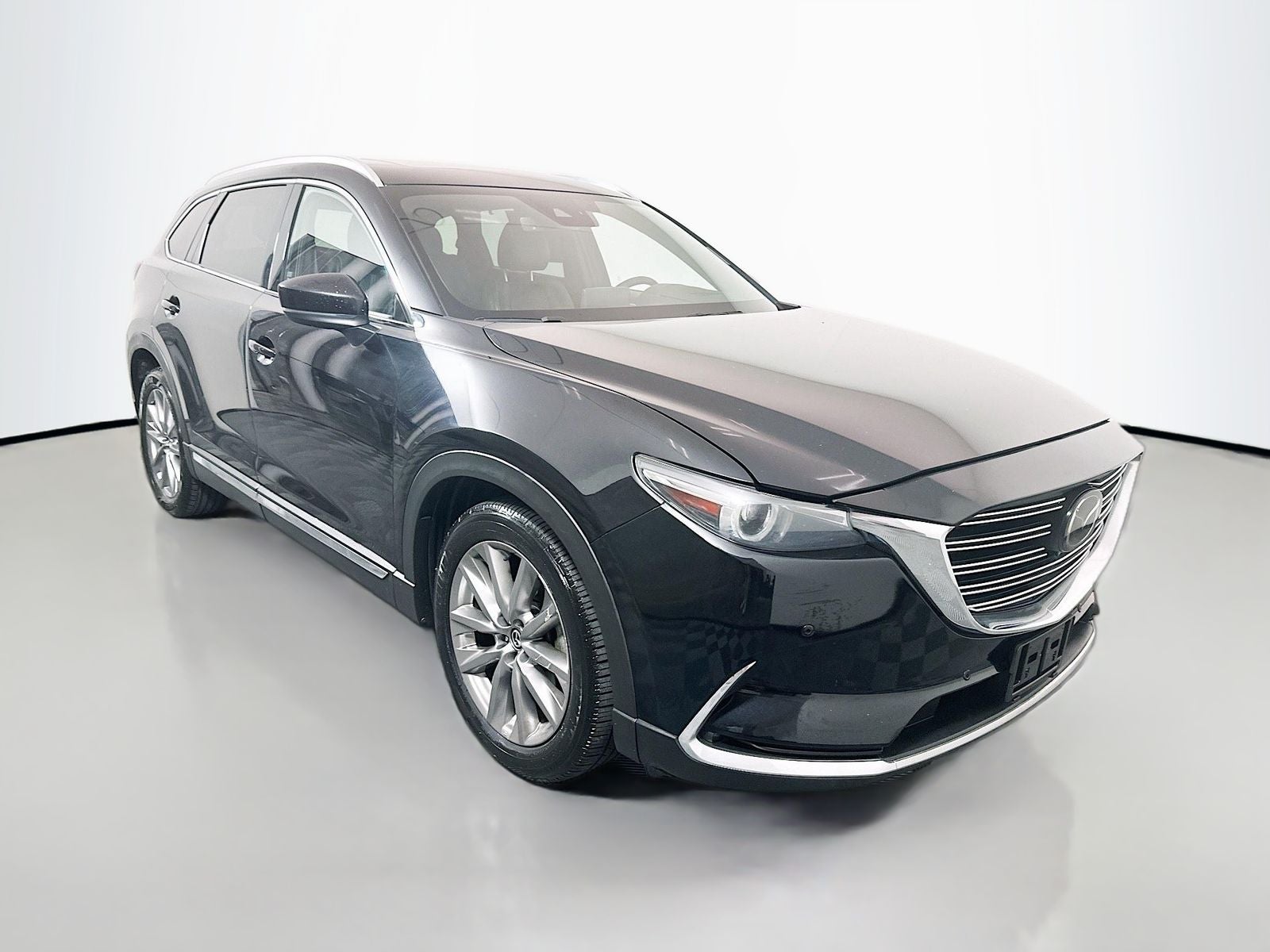 2020 Mazda Mazda CX-9 Grand Touring in Jet Black Mica — front three-quarter view
