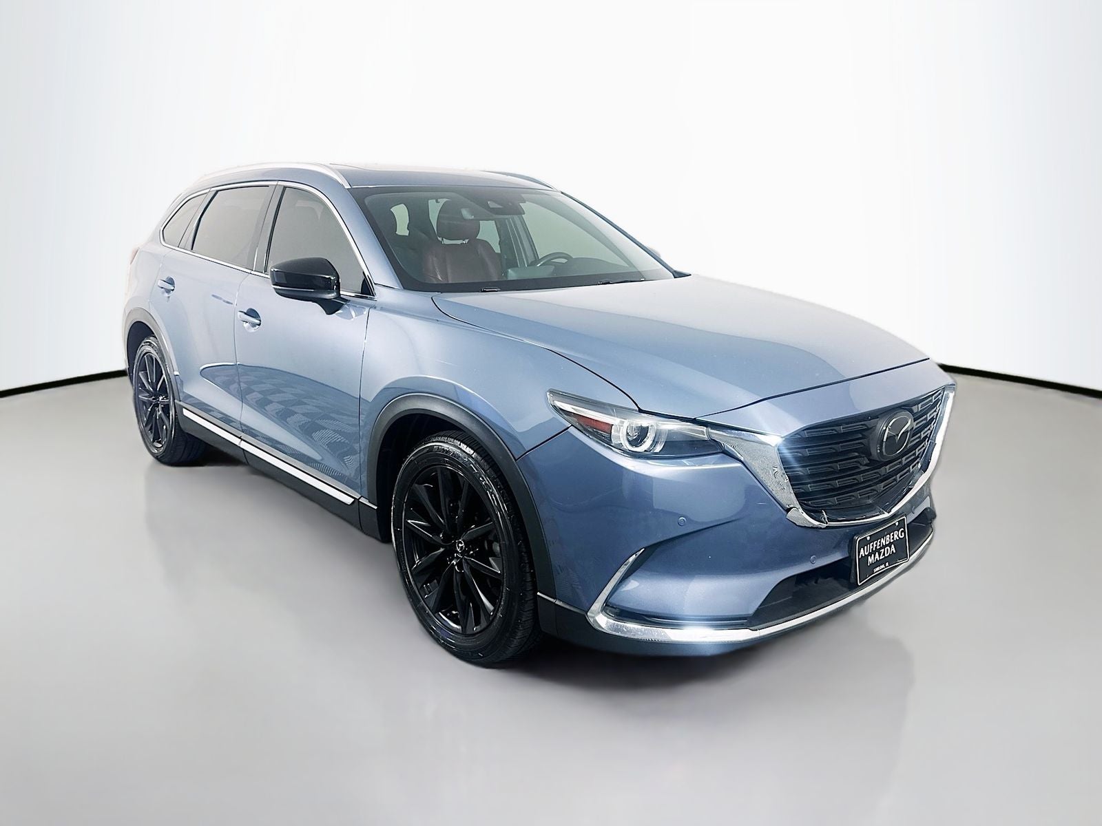 2021 Mazda Mazda CX-9 Carbon Edition in Polymetal Gray — front three-quarter view