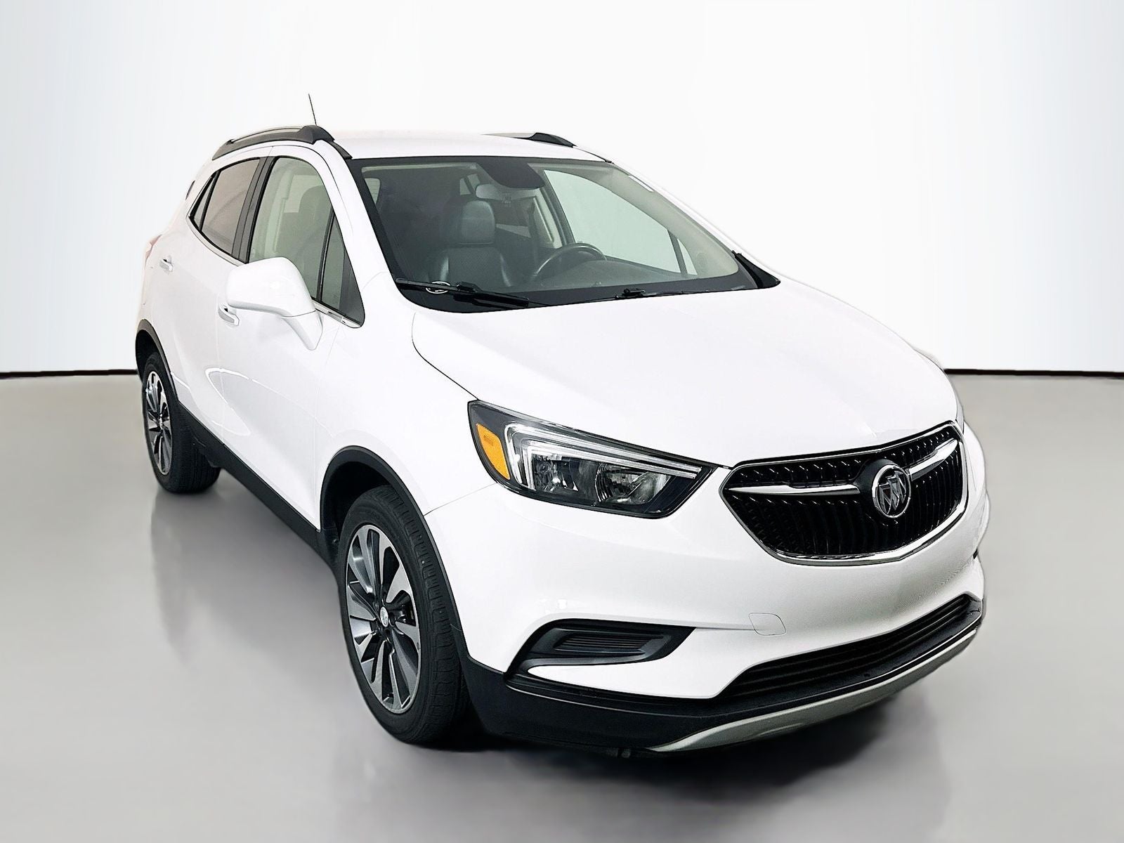 2021 Buick Encore Preferred in Summit White — front three-quarter view