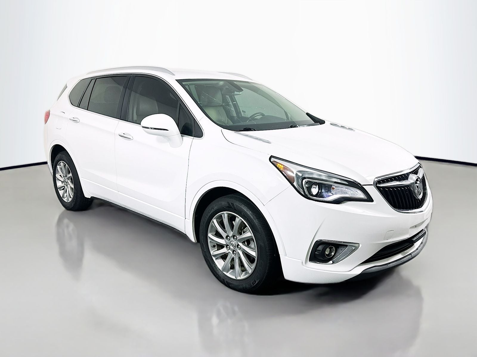 2020 Buick Envision Essence in Summit White — front three-quarter view