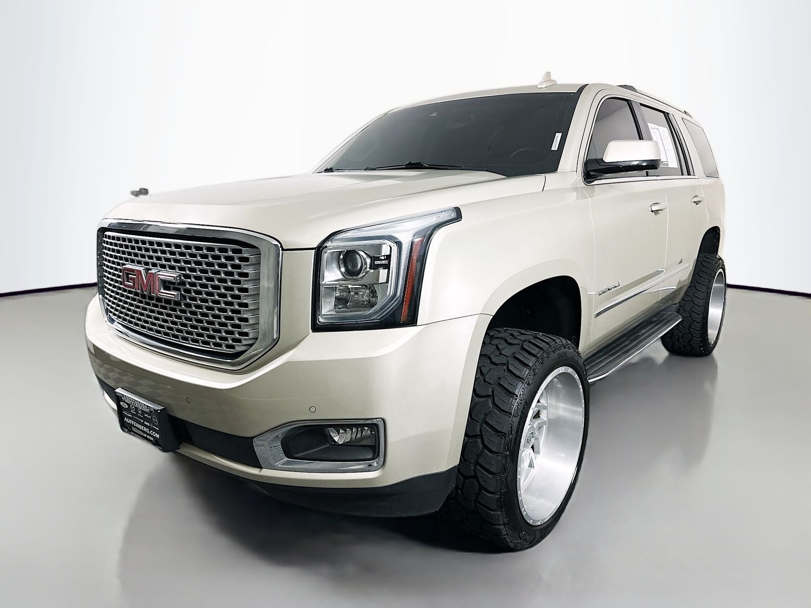 2016 GMC Yukon — rear three-quarter view