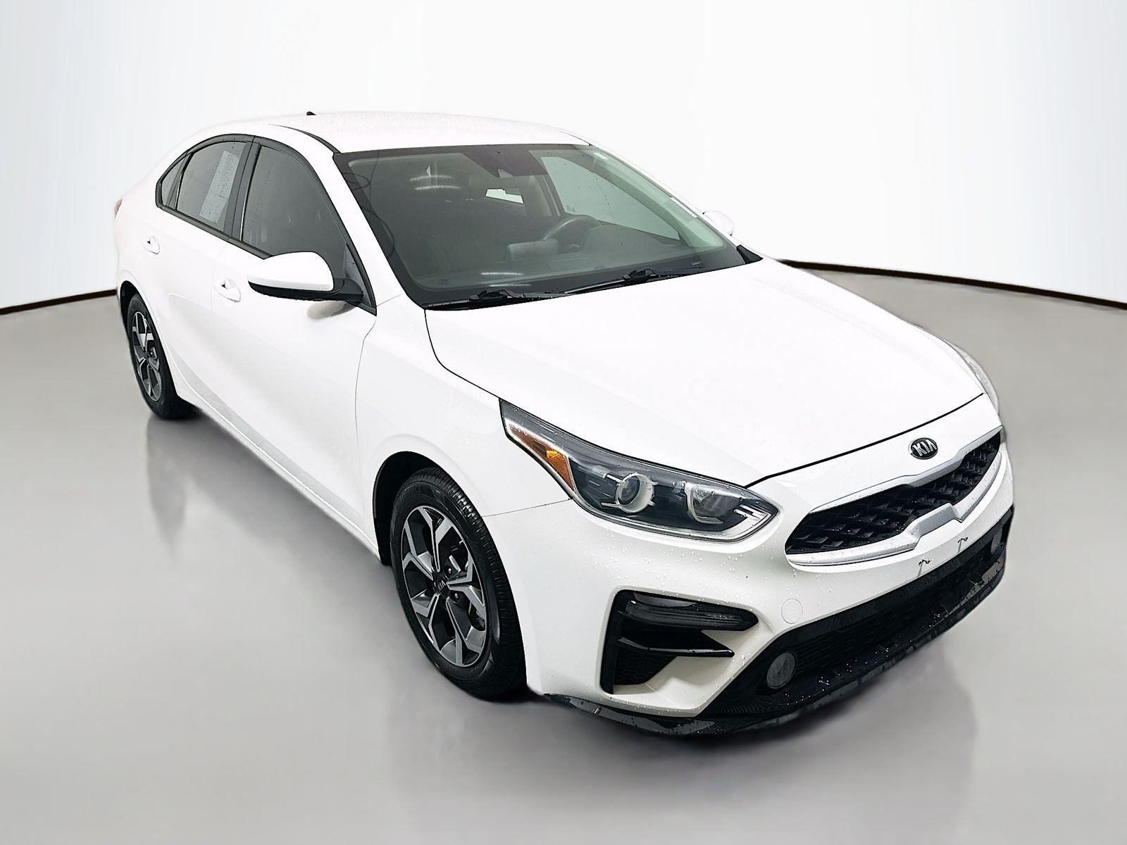 2020 Kia Forte LXS in Clear White — front three-quarter view
