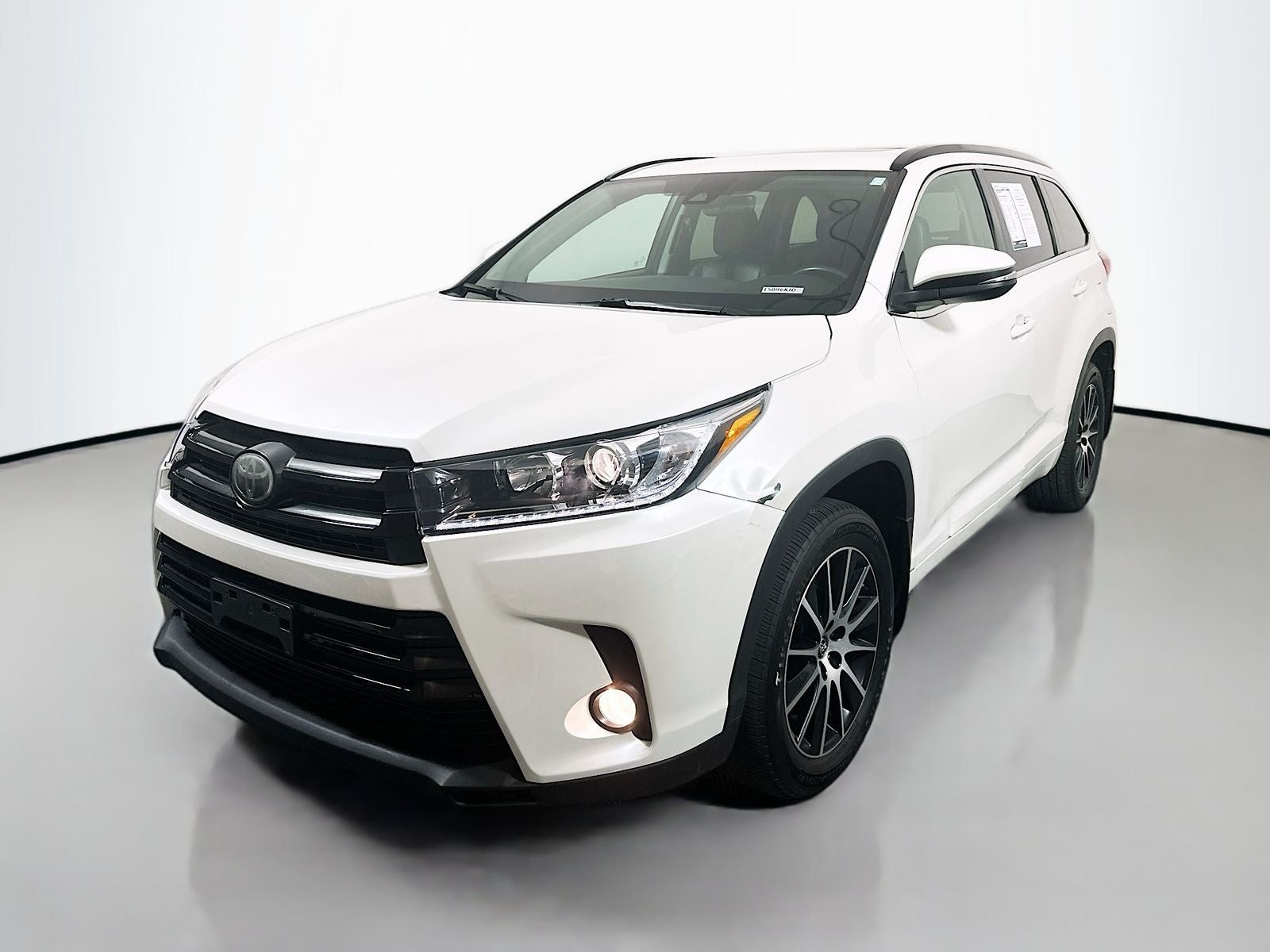 2018 Toyota Highlander — rear three-quarter view