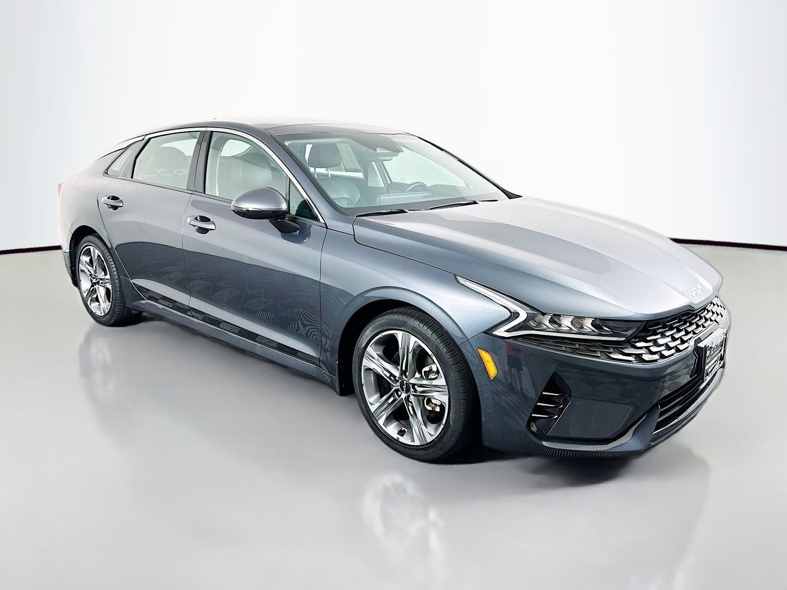 2023 Kia K5 EX in Gravity Gray — front three-quarter view