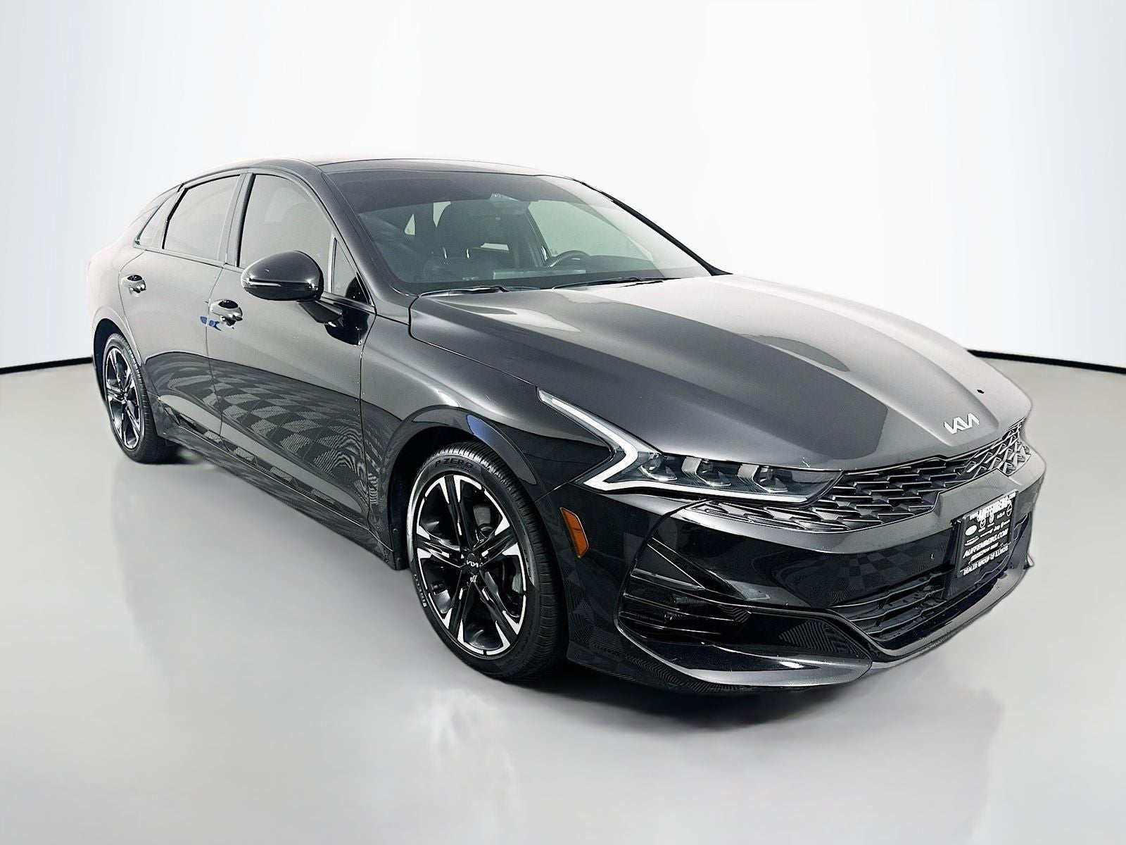 2022 Kia K5 GT-Line in Ebony Black — front three-quarter view