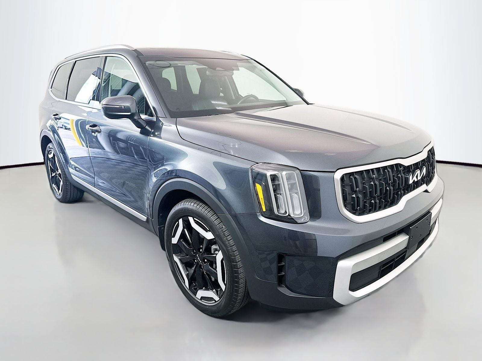 2024 Kia Telluride EX in Gravity Gray — front three-quarter view