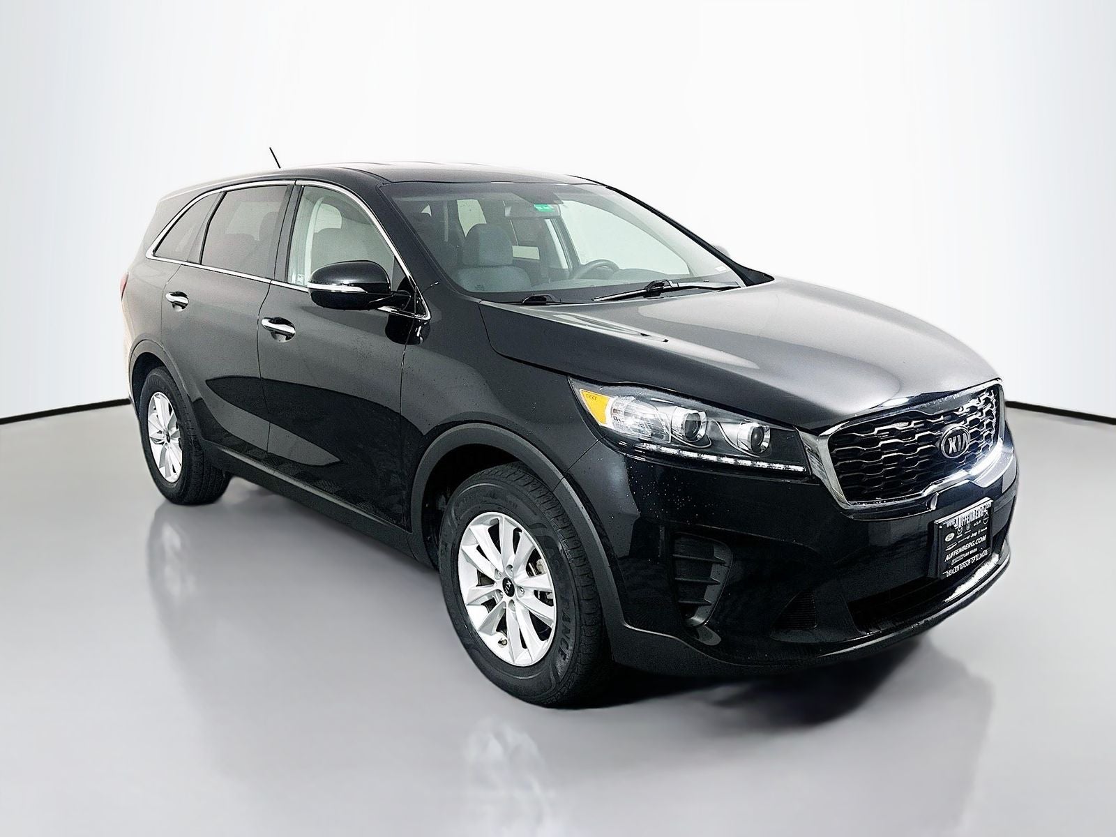 2020 Kia Sorento LX in Ebony Black — front three-quarter view