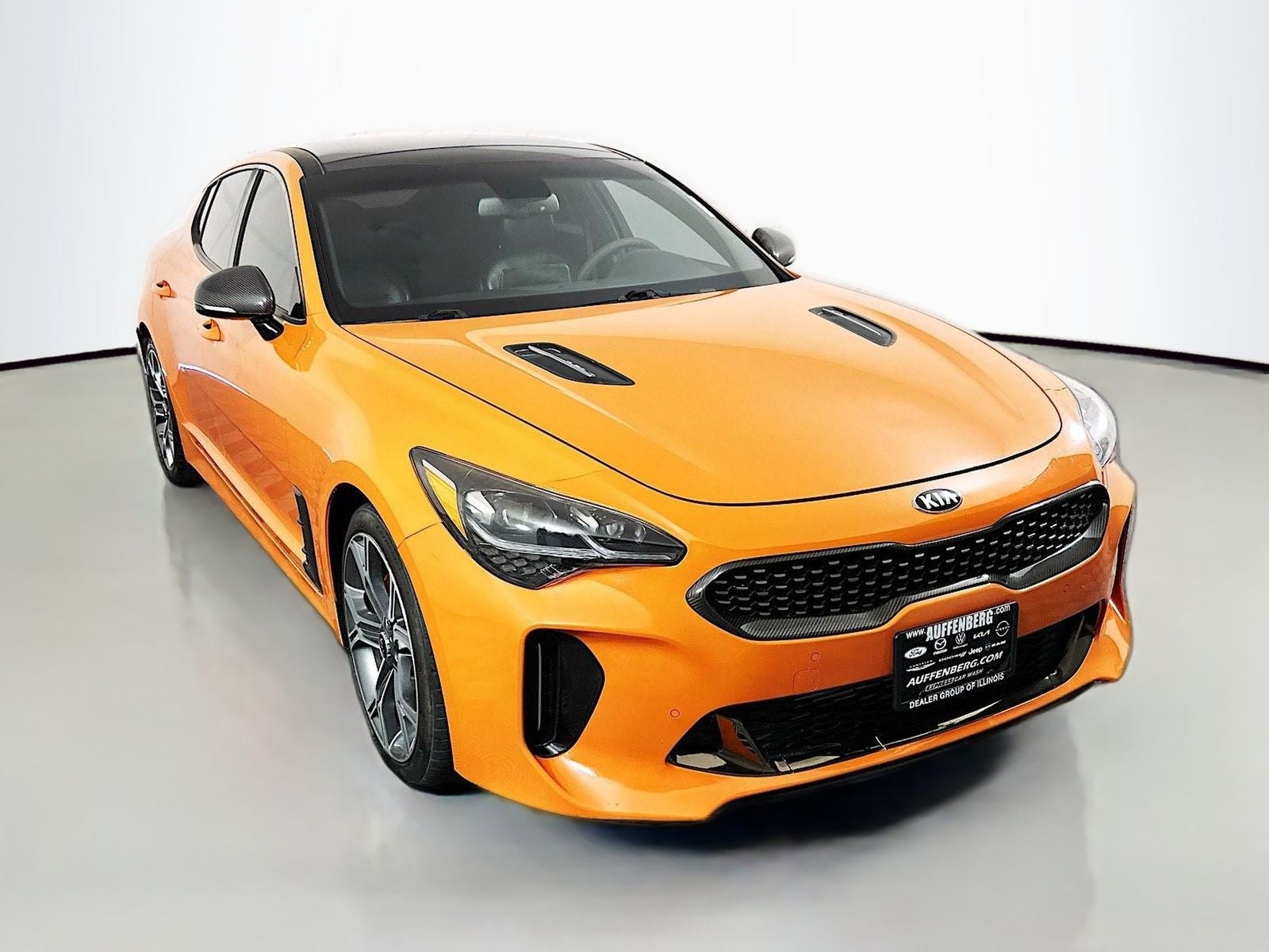 2019 Kia Stinger GTS in Federation Orange — front three-quarter view
