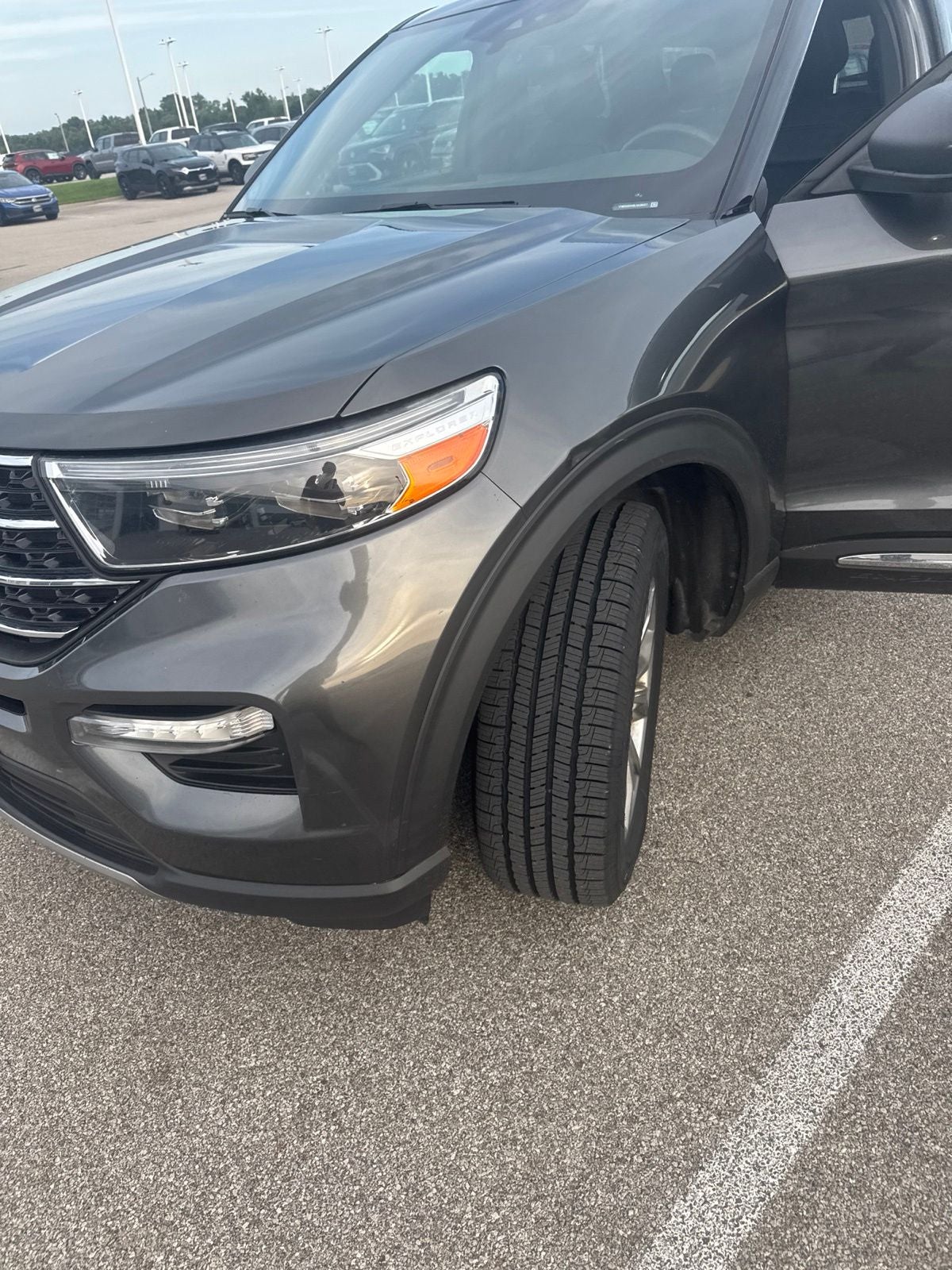 2020 Ford Explorer XLT in Magnetic Metallic — front three-quarter view