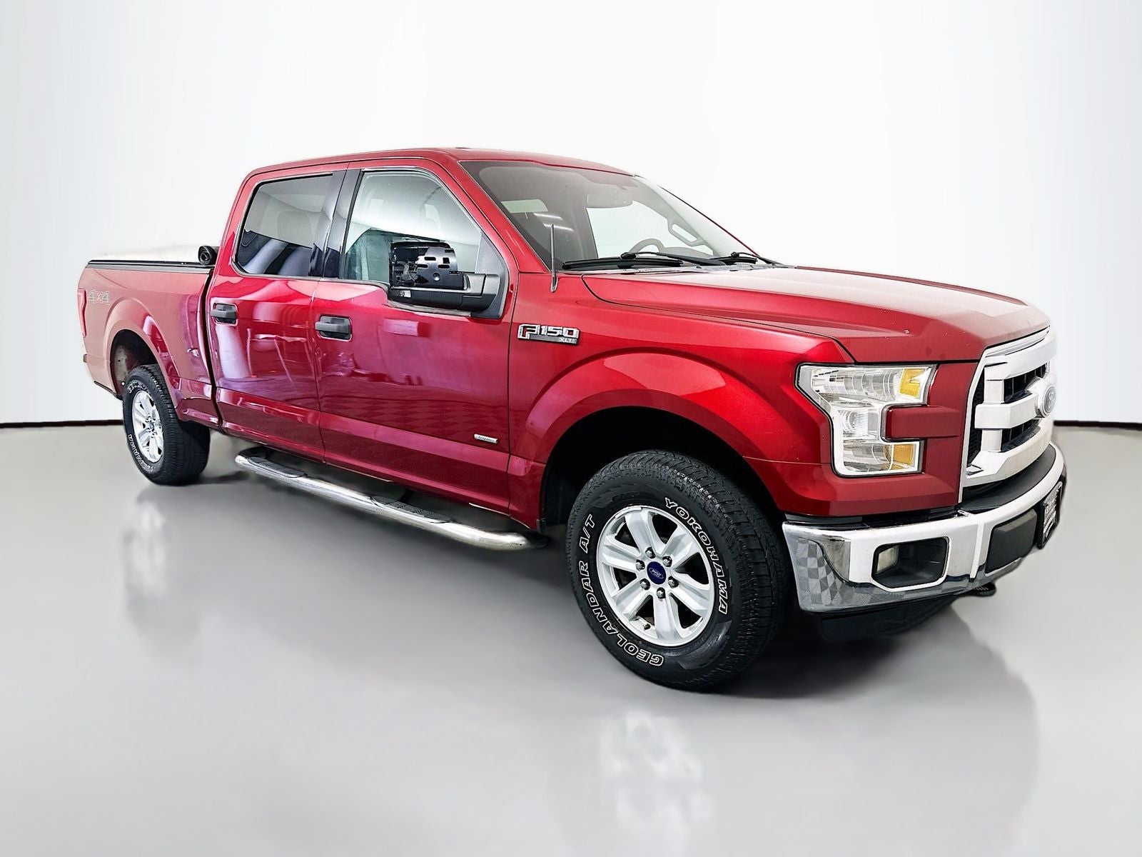 2016 Ford F-150 XLT in Ruby Red Metallic — front three-quarter view