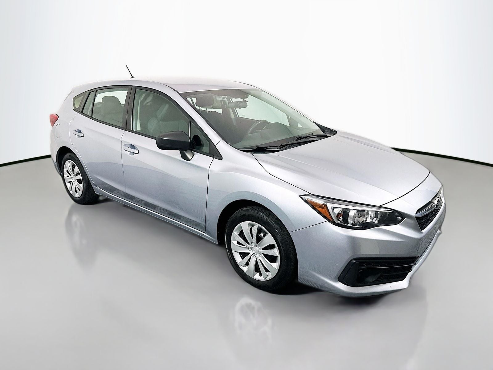 2022 Subaru Impreza 5-door CVT in Ice Silver Metallic — front three-quarter view