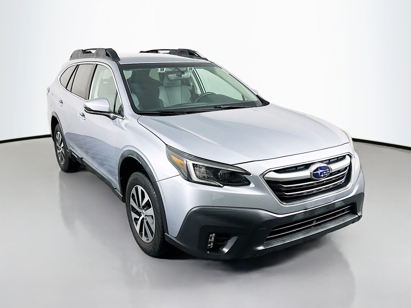 2021 Subaru Outback Premium in Ice Silver Metallic — front three-quarter view