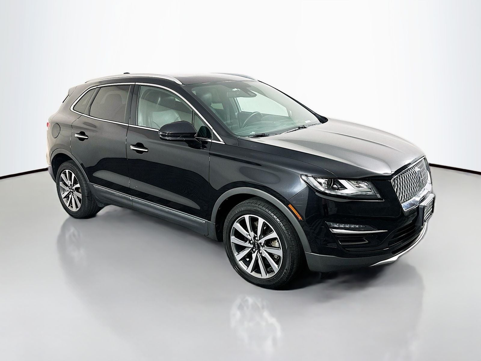 2019 Lincoln MKC Reserve in Infinite Black Metallic — front three-quarter view